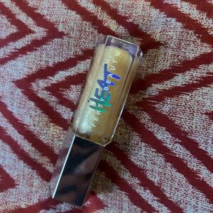 Fenty Beauty Gloss Bomb in Sparkling Gold